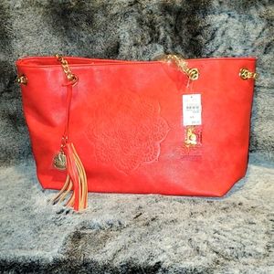 Carlos Santana Medallion Purse